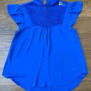 Woman’s blue blouse